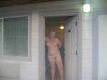 Slut showing off at the motel door