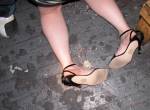 Expensive sandals soaked in floor cum