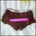 Another dilemma for my husband. I look really tomboyish in the girls boxers, but the pretty pink vibrator sends out a different message.