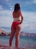 behind