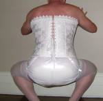 White corset, stockings & plastic panties